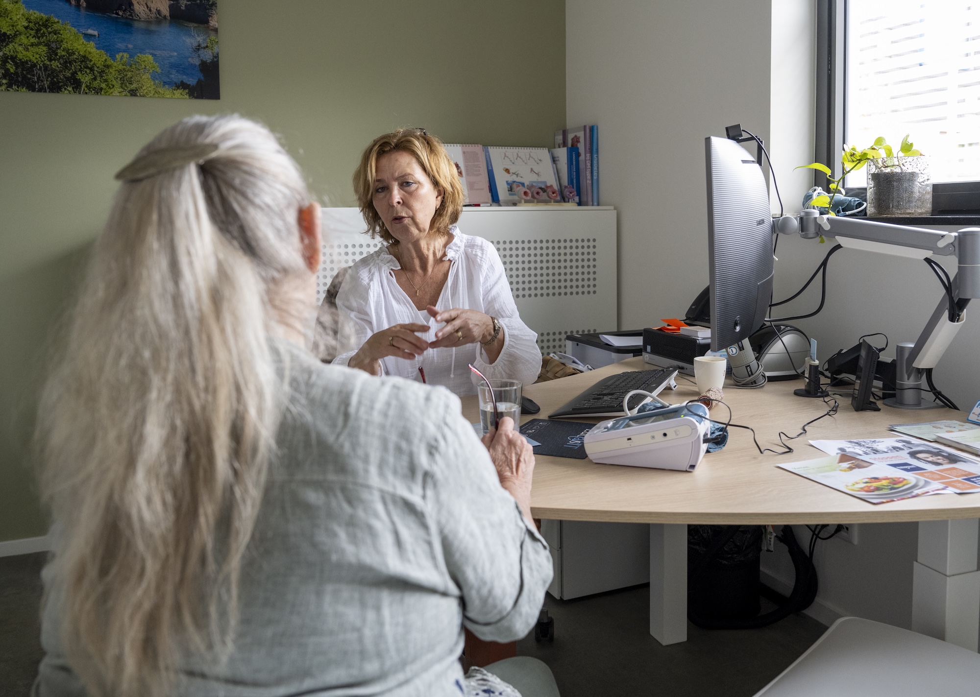Australian female patient having a health consultation with her female doctor